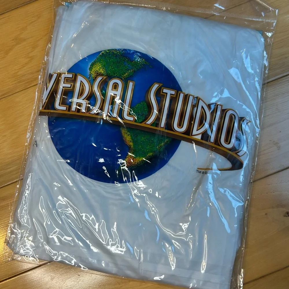 NWOT Universal Studios Adult Vinyl Poncho - Picture 3 of 6